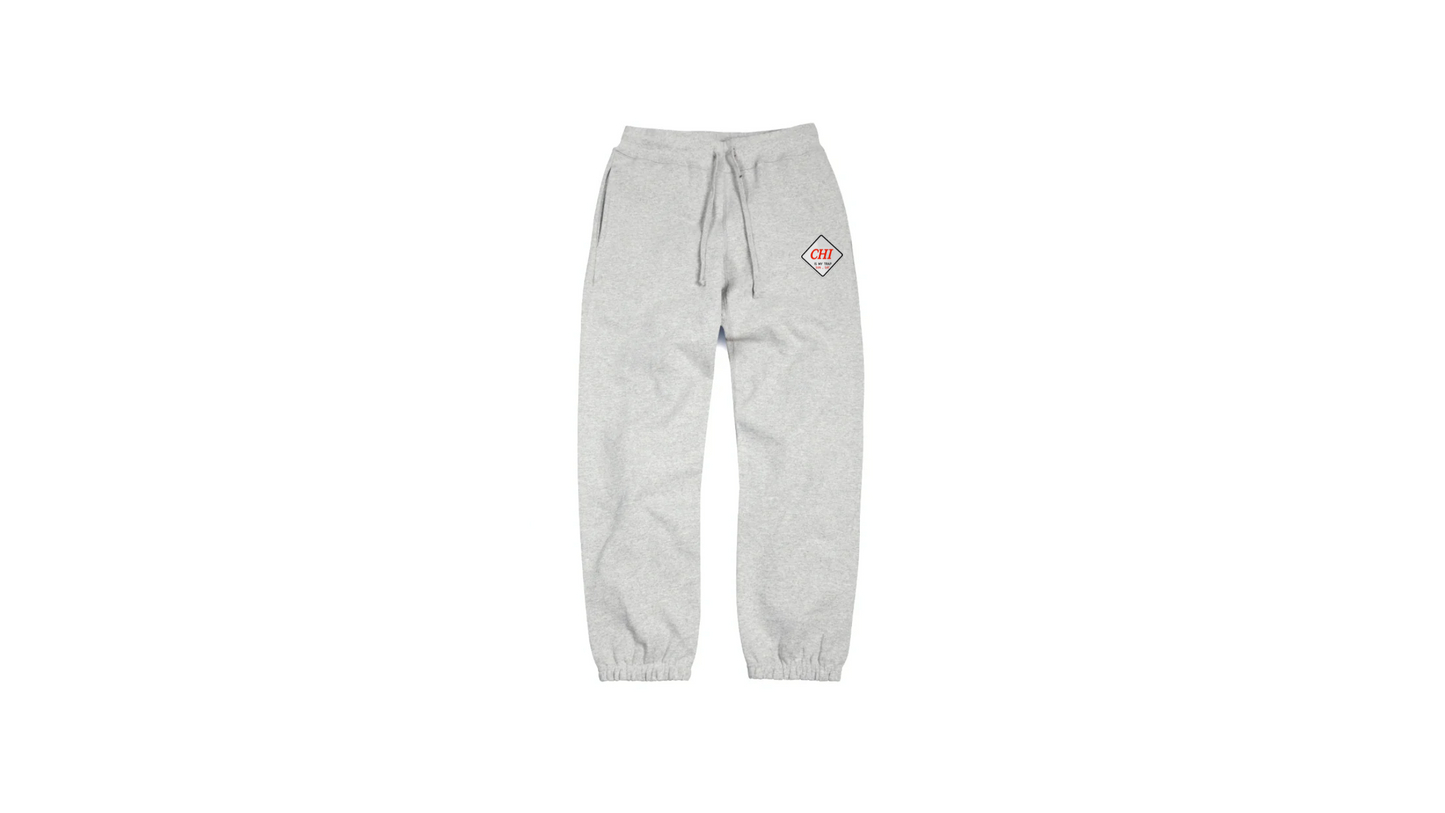 Grey "CHI IS MY TRAP" embroidered jogger pants featuring the "Chi is My
Trap Sun–Sat" slogan stitched down the leg. Premium streetwear inspired by Chicago grind culture and everyday hustle.