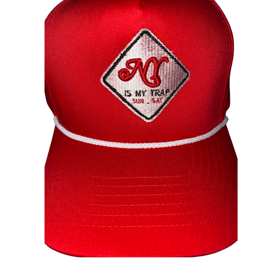 Red snapback with a white embroidered ny is my trap sun-sat logo