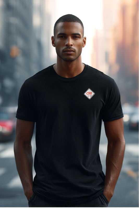 Man wearing a black t-shirt with embroidered chi is my trap sun-sat logo in an urban setting