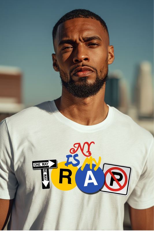 Man wearing a white streetwear t-shirt with ny is my trap text and colorful graphics in an urban setting